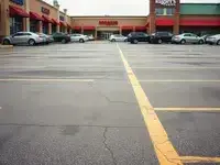 Before: Patchy, uneven parking lot